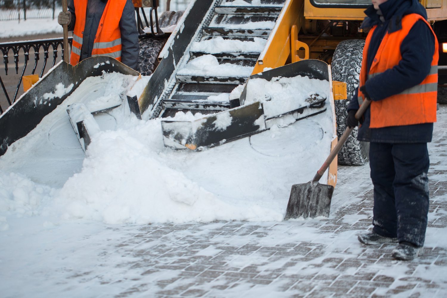 tractor-cleaning-road-from-snow-excavator-cleans-streets-large-amounts-snow-city-workers-sweep-snow-from-road-winter-cleaning-road-from-snow-storm